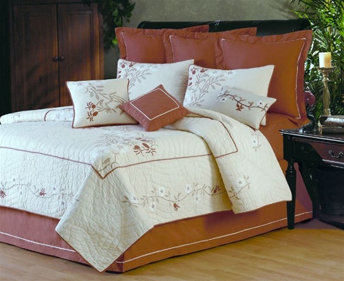 Cherry Blossom- So simple and yet so beautiful is this classic design with an updated look. A quilted frame background with artistically drawn embroideries will add just the right amount of color to your room. Rich amber color