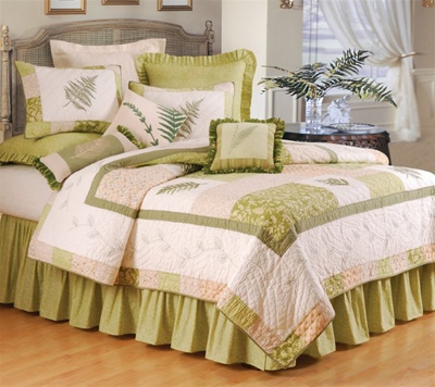 Fern Valley- captures the simplistic look of fresh ferns on white ground. The patchwork design is framed with a solid green band and the border design has delicate embroidered ferns. Decorative pillows include a hooked pillow, and embroidered pillows