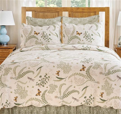 A fresh botanical print of ferns, flowers butterflies and dragonflies on a cream background. The florals are predominantly green with gold highlights.The quilt reverse, Euro shams and bedskirts feature a medallion print in mossÂ  to compliment the floral.