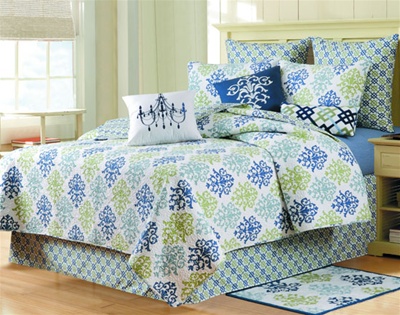 Shabby Chic-A mix of casual contemporary with traditional design elements is the theme for this attractive quilt and matching accessories. 
Featuring a crisp white base adorned by a lovely damask print in sky blue, navy blue, and sage.