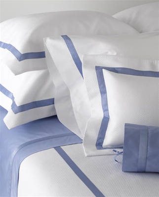 Easy-care diamond pique embellished with a 1â€ sateen tape detail.  Duvet covers and coverlets have a U shaped design on the top of the bed with a 3" flanged border on three sides with taping.