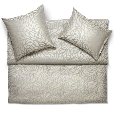 The RAMI designâ€˜s curved flower tendrils and tree branches trail majestically across the entire piece as if they were growing along a wall. The monochrome background is elegantly wreathed in shiny satin veins.