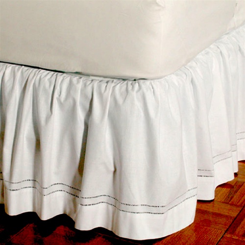 Gathered Hemstitch - An intricate double hemstitch design. Bedskirts are machine washable, 100% cotton with split corners to accommodate footboards. Available in 14", 18" and 21" heights.  These bedskirts can be used under print bedskirts to create stylis