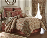 Harrogate by Rose Tree, A classic allover damask design in rich earth tone colors of red, gold and green on an ivory ground.
The oversize comforter reverses to a neutral diamond geometric design in cream and taupe. Elegant decorative pillows