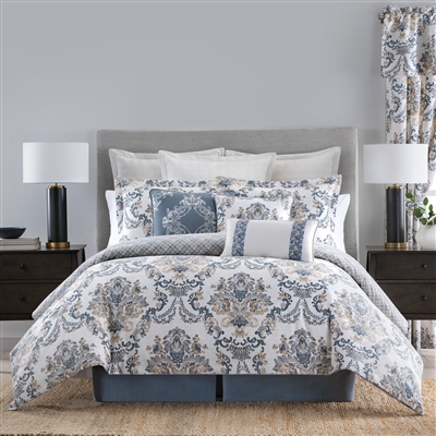 Jillian by Rose Tree- is sophisticated and elegant. The classic Damask motif adds a timeless look to any bedroom.
The centerpiece is the comforter that features oversize damask bouquets in tones of stone blue, grey, and tan on a white ground.
