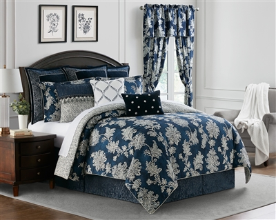 Kylie by Rose Tree, An allover Jacobean pattern in off white on a navy textured ground reversing to an allover tile pattern in navy on an off white ground. Comforter and shams are trimmed with a twist cord in off white