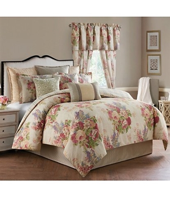 Enhance your room with this elegant English floral. Beautiful multicolored floral bouquets of red, pale gold, taupe and green on a linen color ground. The oversized comforter reverses to a plaid in blue, brown and taupe.