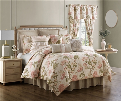Add a touch of Spring with this softly colored floral vine design. Beautiful climbing florals of blush pink and green on a geometric ground of ivory and linen will create a spacious look to any room. The floral comforter reverses to an all over foulard