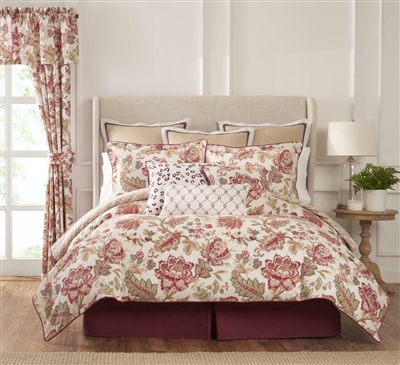 Emory- Top of bed features a large scale Jacobean floral in tones of red, rose, linen and taupe with touches of green and blue on a white ground.