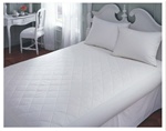Filled with a 100% cotton fill, this mattress pad is styled in an elegant, quilted 6 inch diamond stitch that holds the 100 % cotton fill in place. The cotton skirt with elastic all around, and spandex corners, help keep the pad securely on the bed