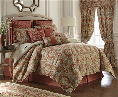 Harrogate by Rose Tree, A classic allover damask design in rich earth tone colors of red, gold and green on an ivory ground.
The oversize comforter reverses to a neutral diamond geometric design in cream and taupe. Elegant decorative pillows